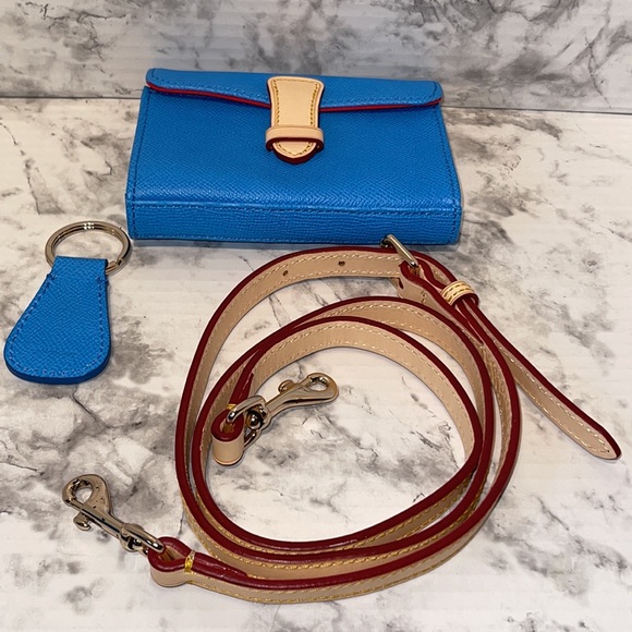 Dooney & Bourke handbag with shoulder strap, key chain, and small coin holder. - Picture 10 of 16